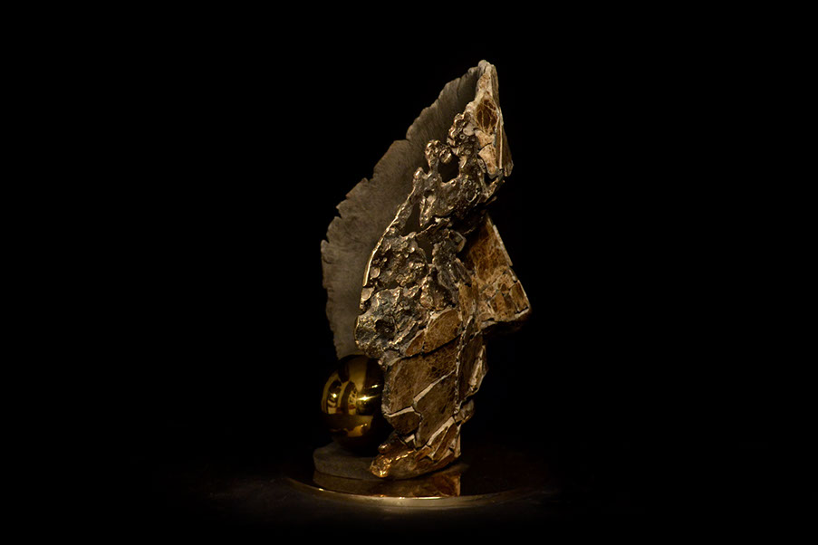 Giuseppe D'Angelo scultura un viso in bronzo e marmo emperador