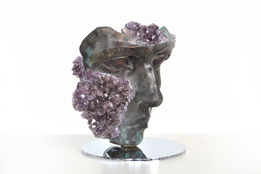 Giuseppe D'Angelo scultura un viso in bronzo e marmo emperador