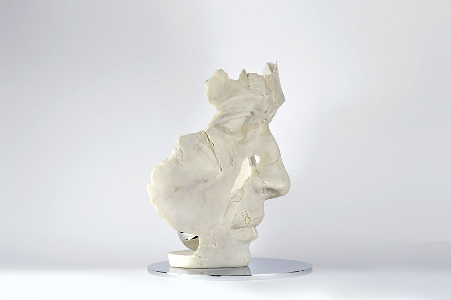 Giuseppe D'Angelo scultura un viso in bronzo e marmo emperador
