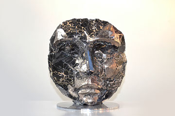 Giuseppe D'Angelo una scultura un viso in alabastro e bronzo 